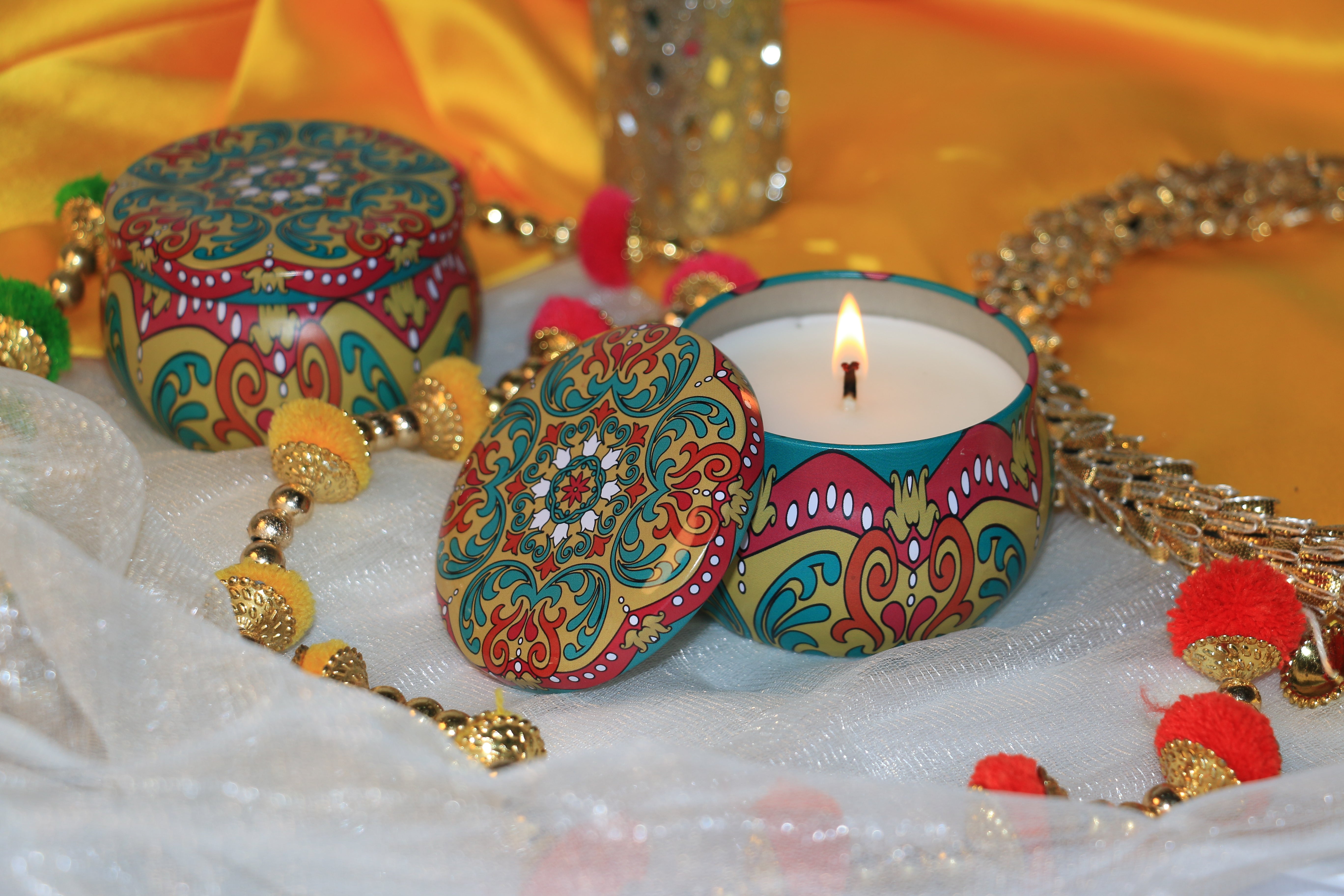 Assorted Printed Tin Candles – Stylish & Fragrant