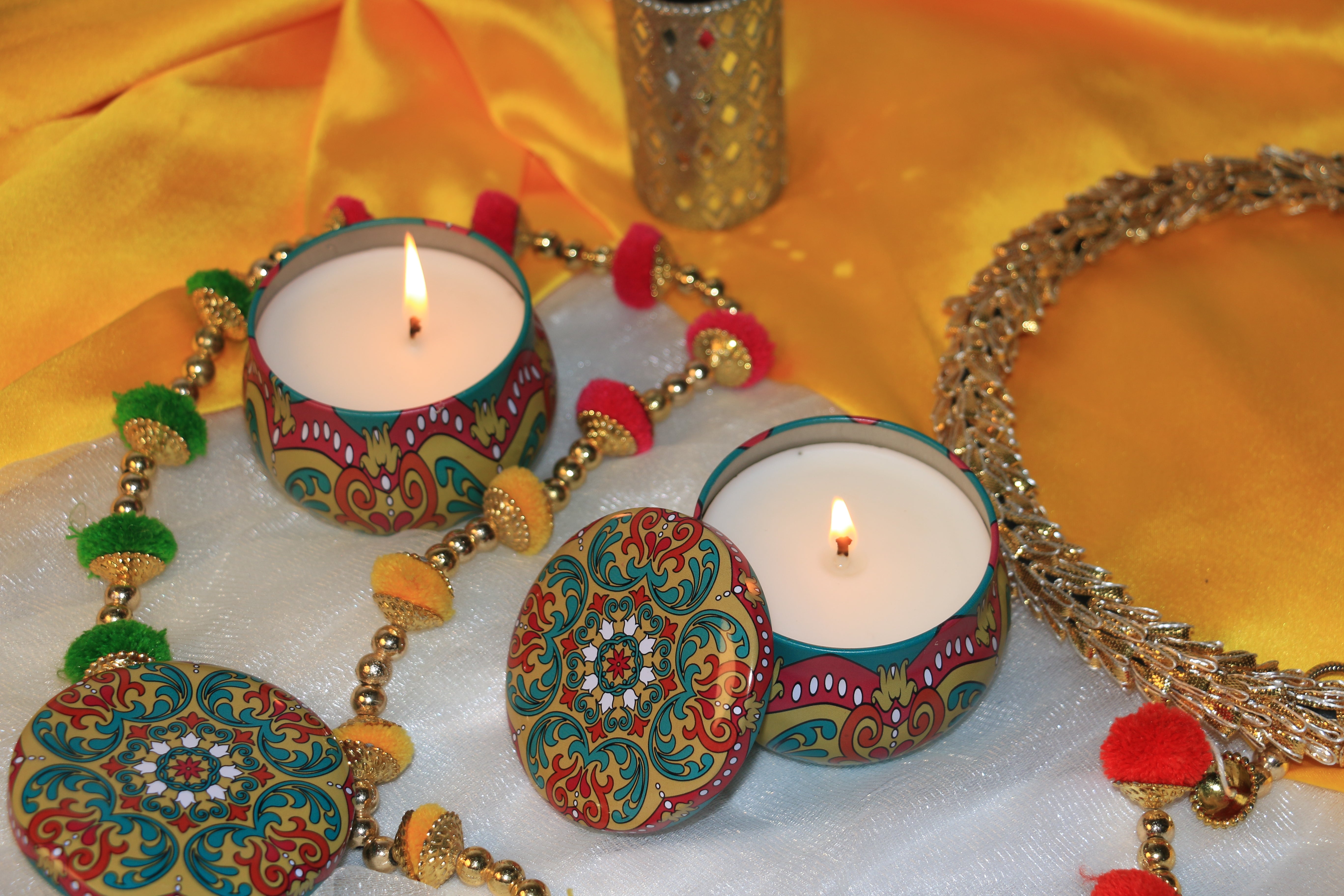Assorted Printed Tin Candles – Stylish & Fragrant