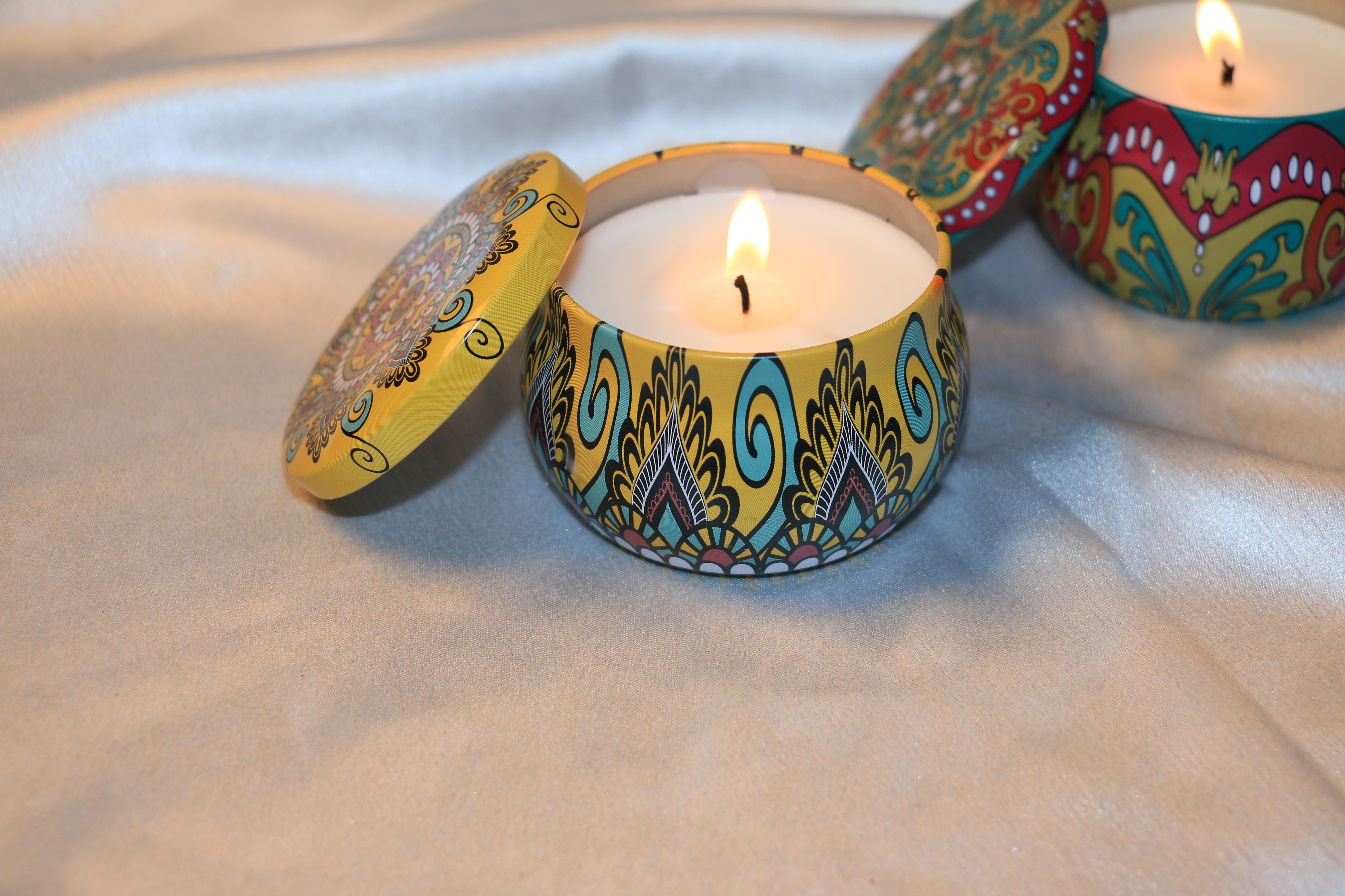 Assorted Printed Tin Candles – Stylish & Fragrant